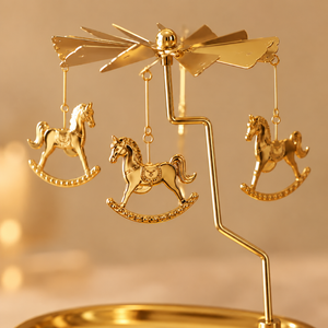 Golden candle carousel with tray, detail of gold rocking horses and rotor - Eco Candle Project